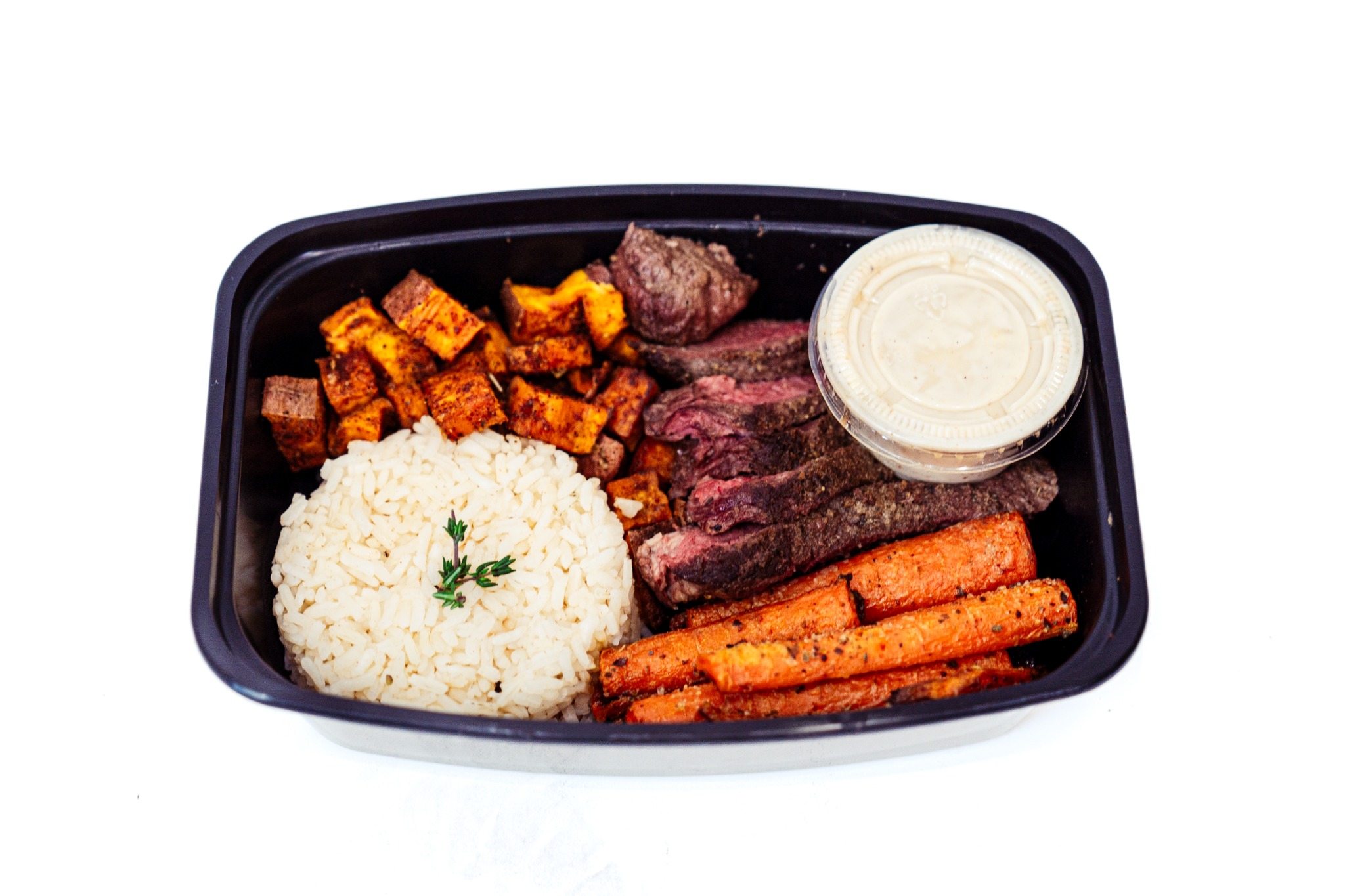 Grass-fed steak with sweet potato and roasted carrots